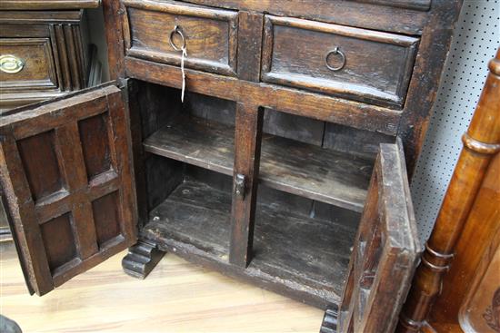 An antique Spanish walnut food cupboard, W.2ft 10in. D.1ft 7in. H.4ft 10in.